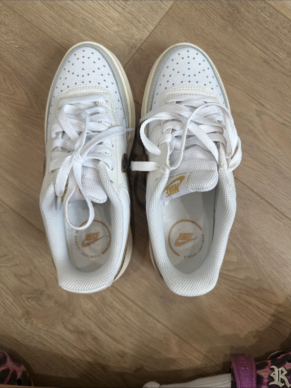 Nike White Leather Low-Top Sneakers with Gold Logo